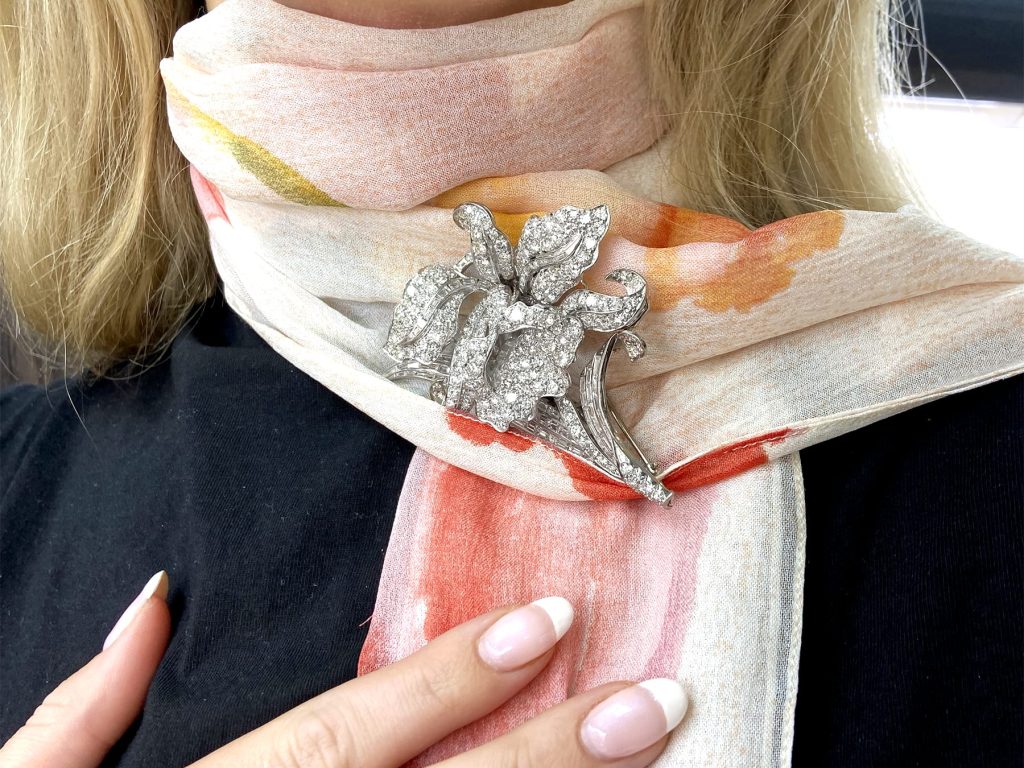 wearing diamond brooch