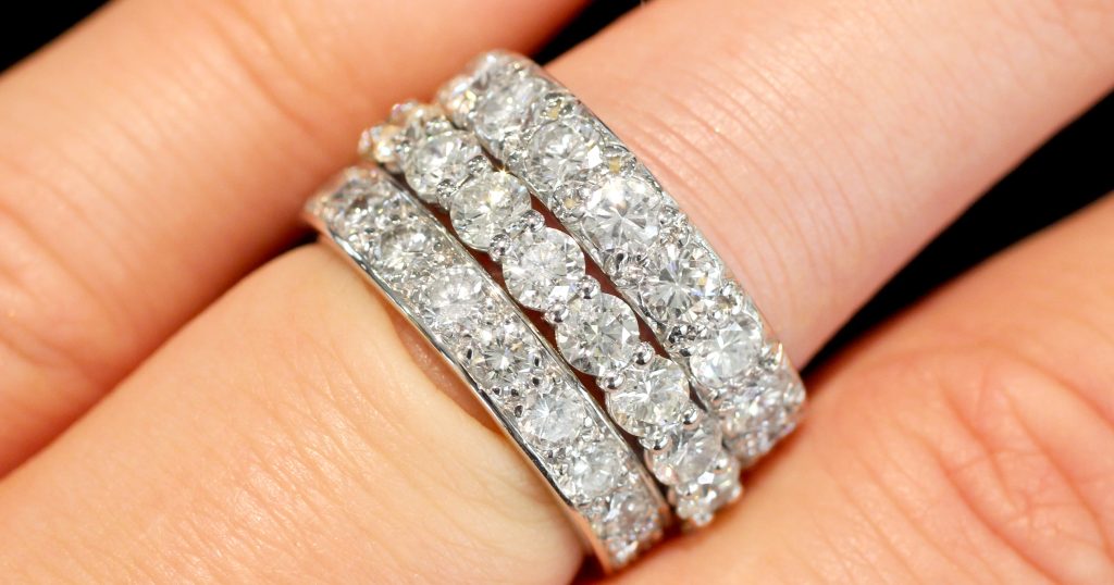 Stacking antique eternity rings for a modern style. 