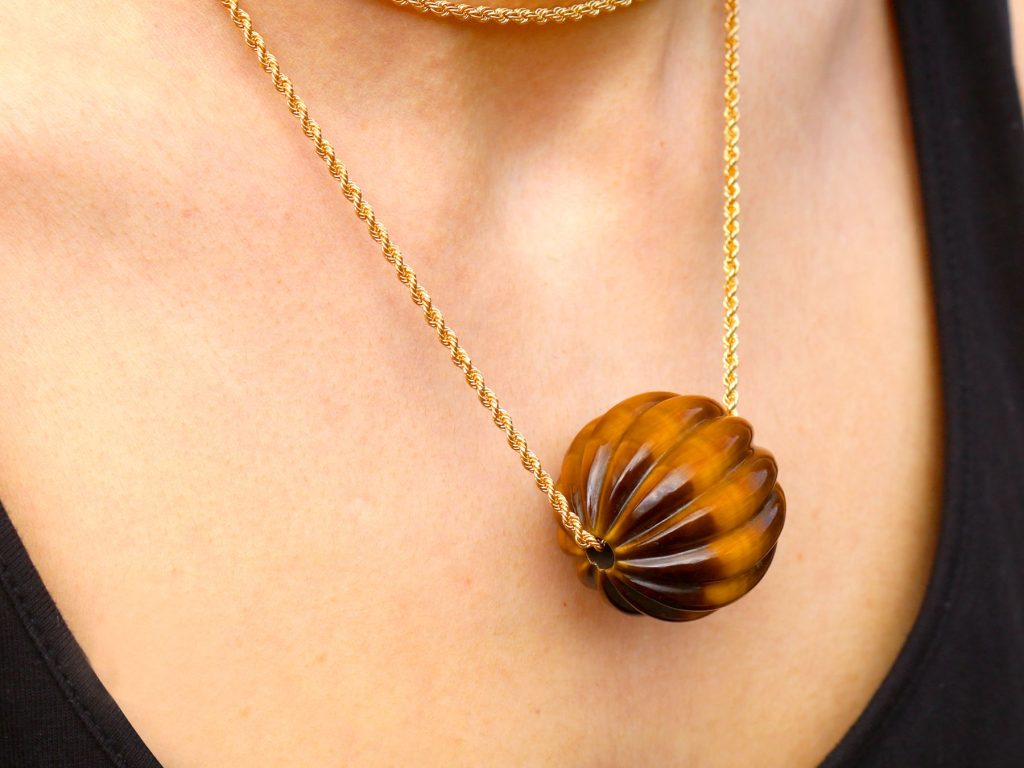 wearing 1970s tigers eye pendant