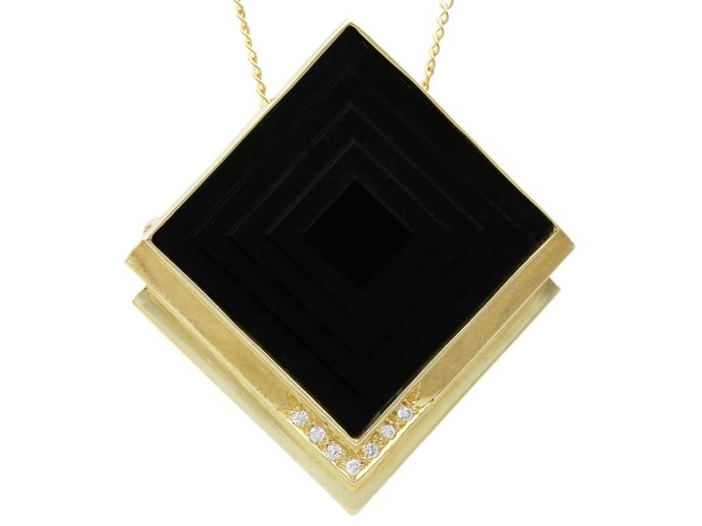 1970s geometric onyx and diamond pendant