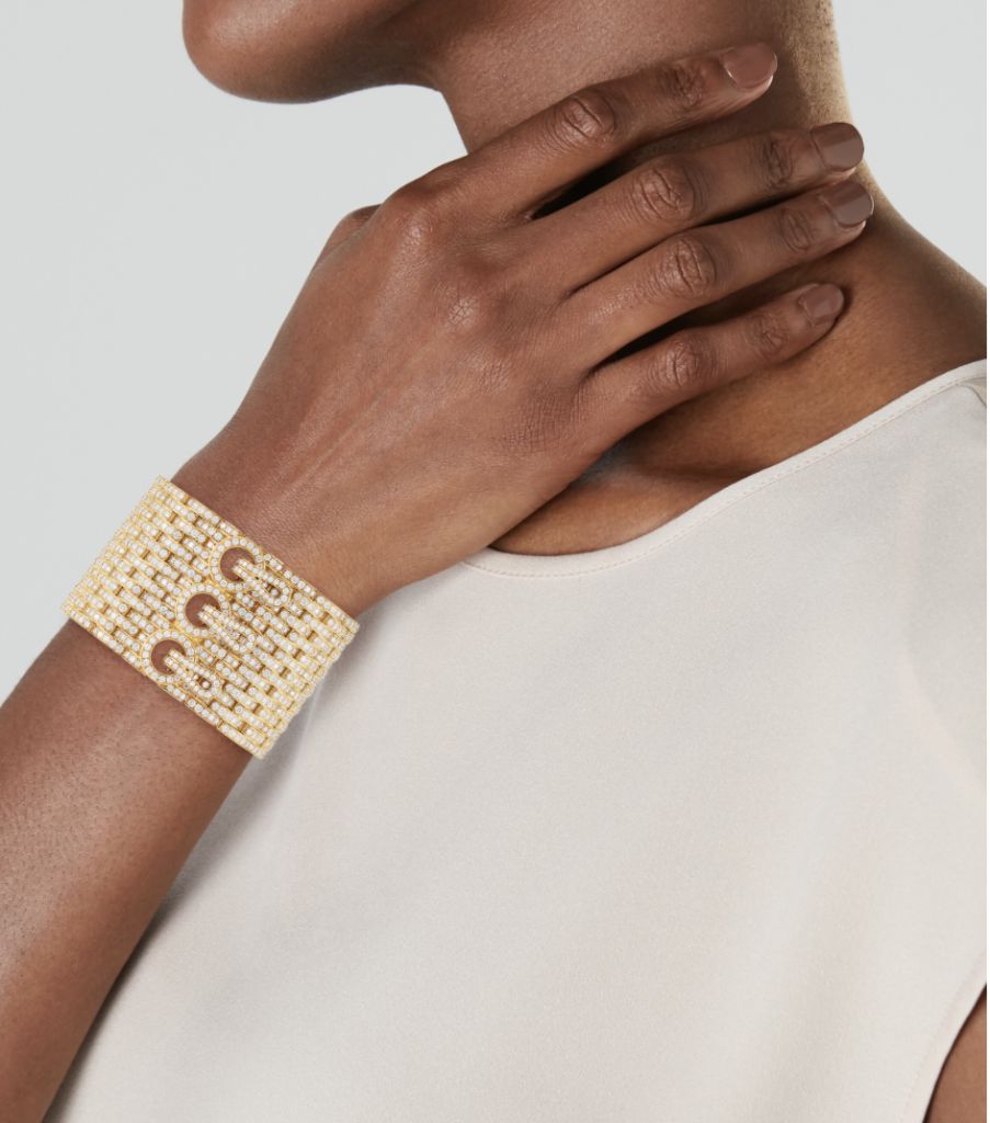cartier gold bracelet on wrist