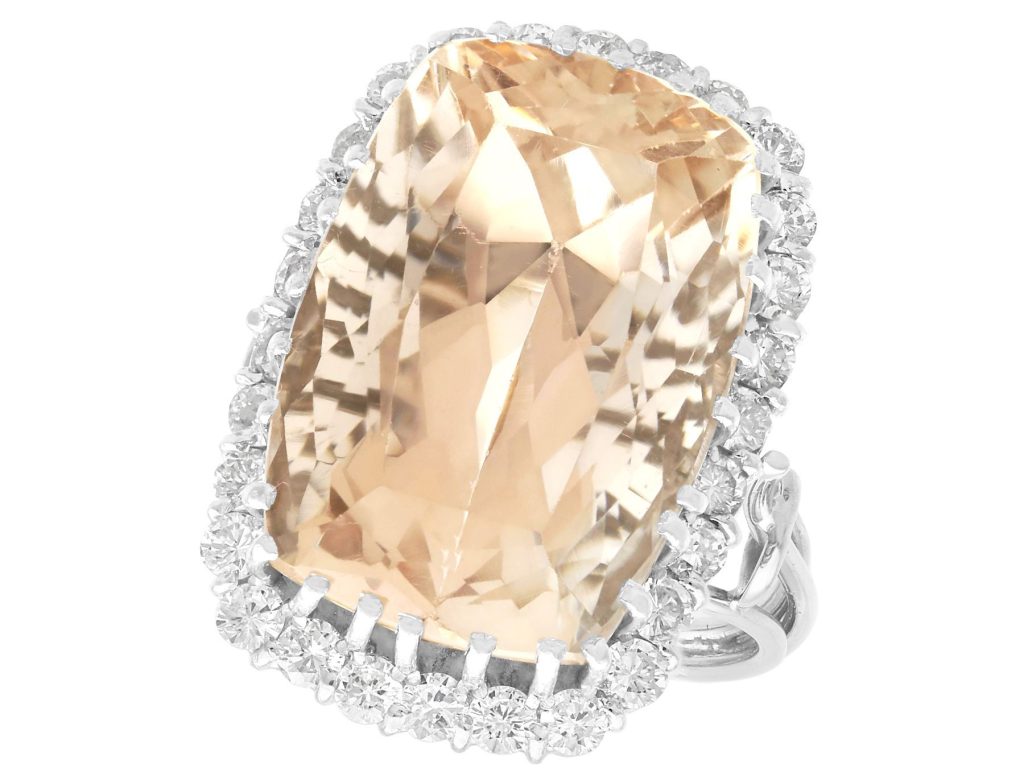 Cushion cut ring with diamond halo