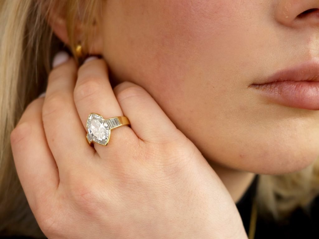 marquise cut diamond ring being worn