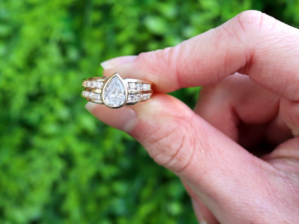 pear cut diamond yellow gold ring outside 