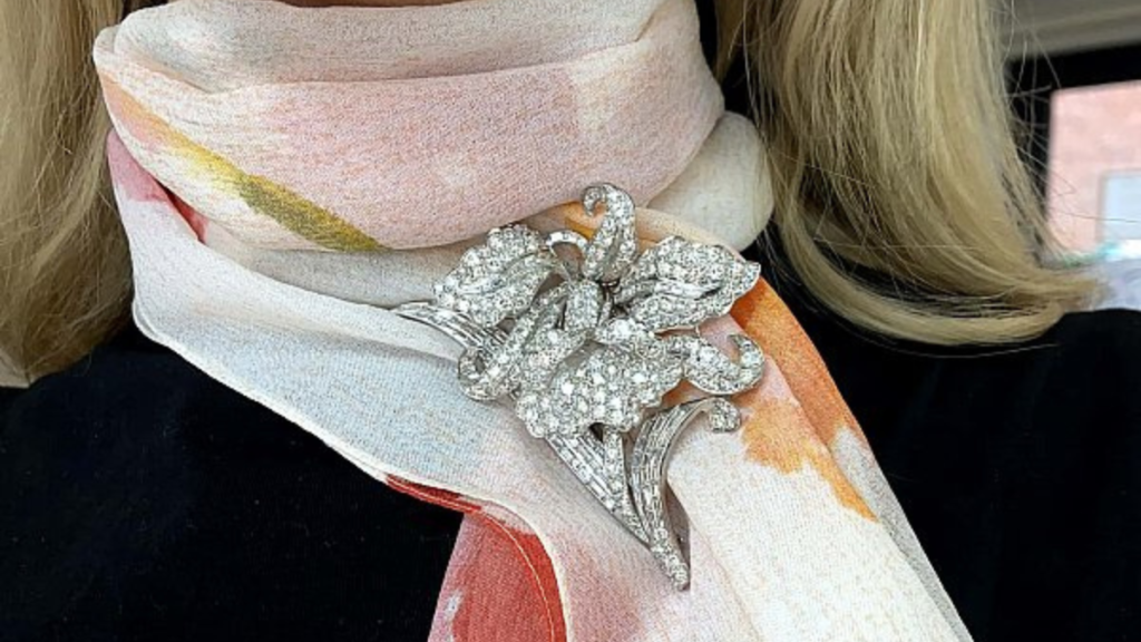 diamond flower brooch on scarf