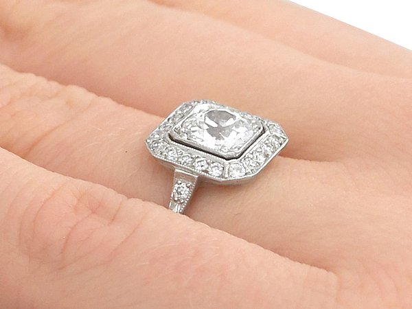 halo engagement rings on hand