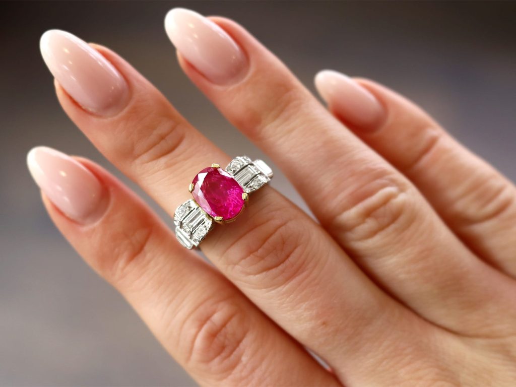 Burmese ruby and diamond ring on finger 