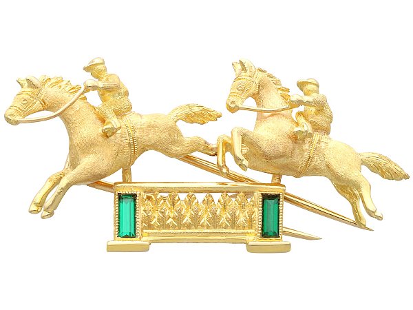 gold and emerald horse brooch 