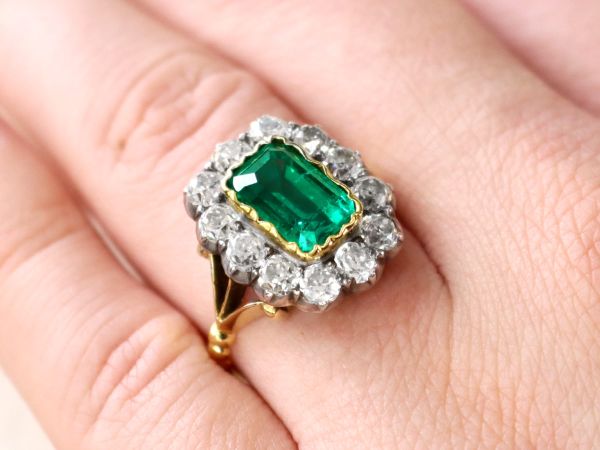 emerald and yellow gold ring 
